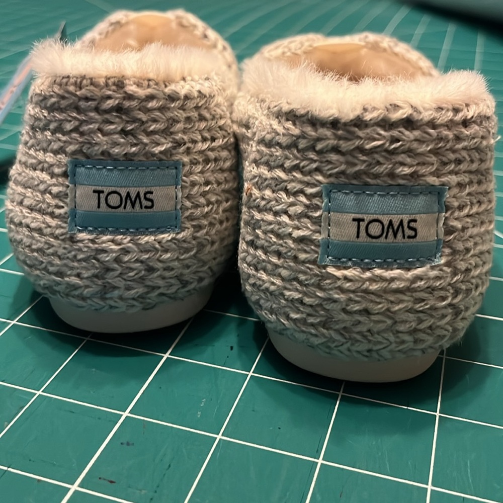 Toms NWT never worn, cozy sweater knit shoes. Could be slippers or for outside.